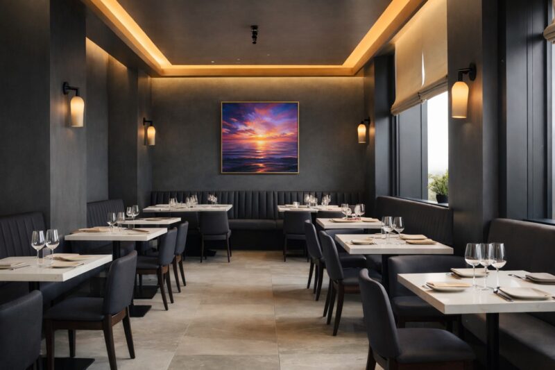 Restaurant interior with cushioned chairs, banquette seating, and well spaced tables